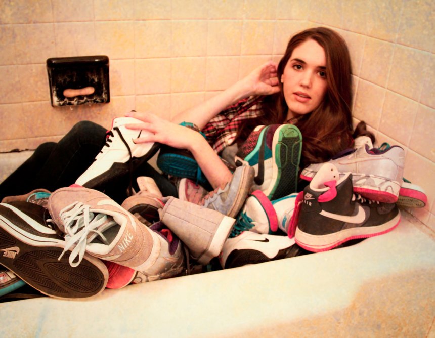 bathtub full of Nikes